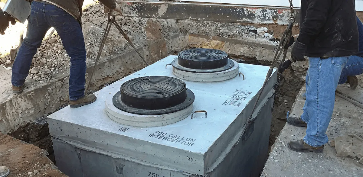 Grease trap installation for a commercial property drainage system in New Orleans, LA